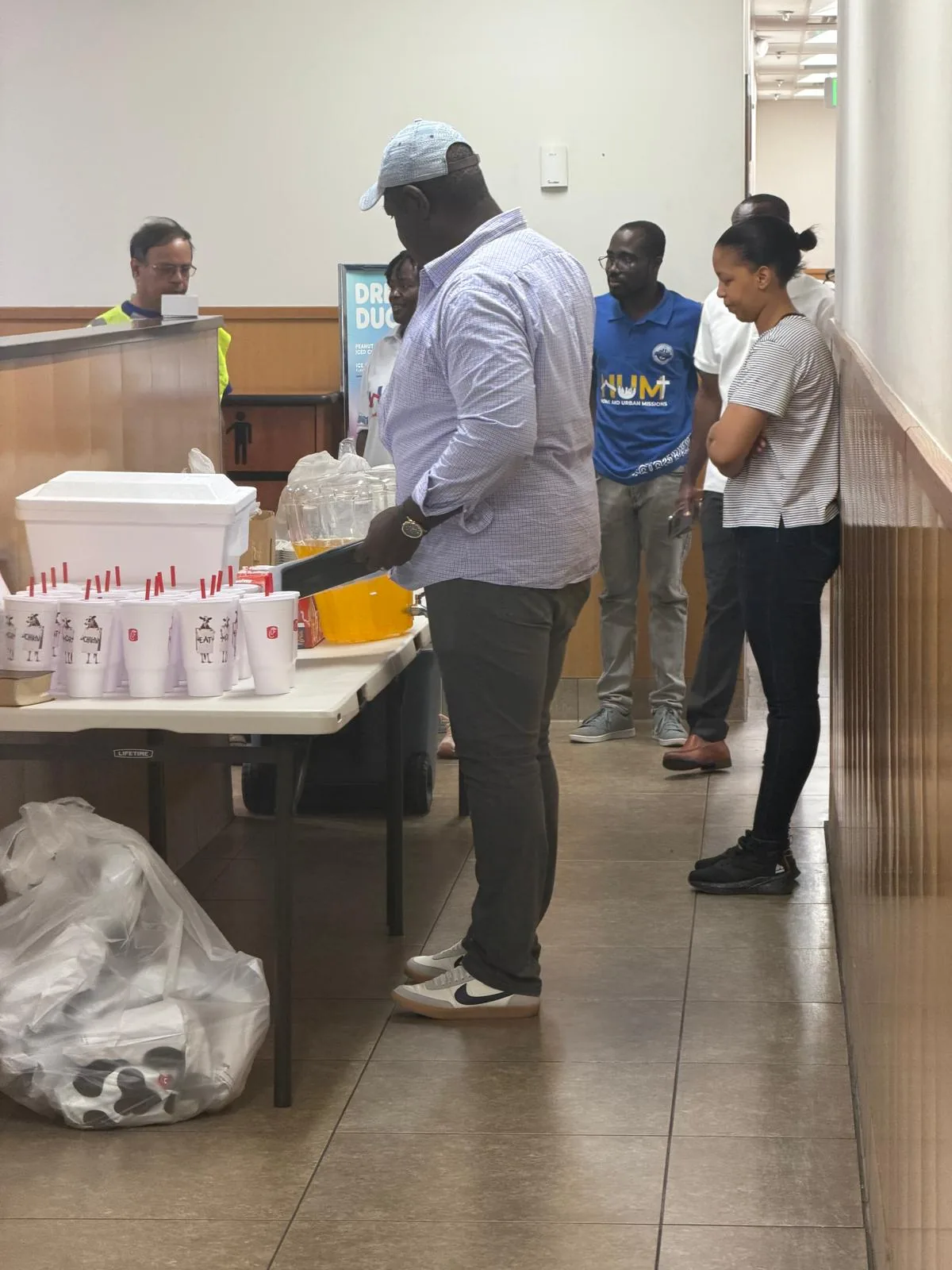 MHC Home and Urban Missions volunteers serving refreshments at Denver Rescue Mission